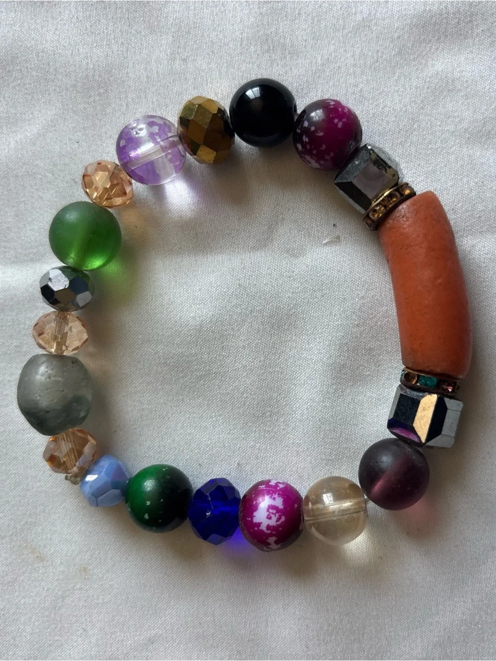 Multicolor Beaded Stretch Bracelet with Orange Accent